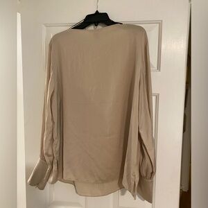 H&M blouse. New with tag. Long sleeve. 100% polyester. XL